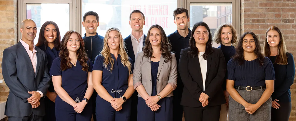 The team posing for a photo at Shift Health in Chicago, IL