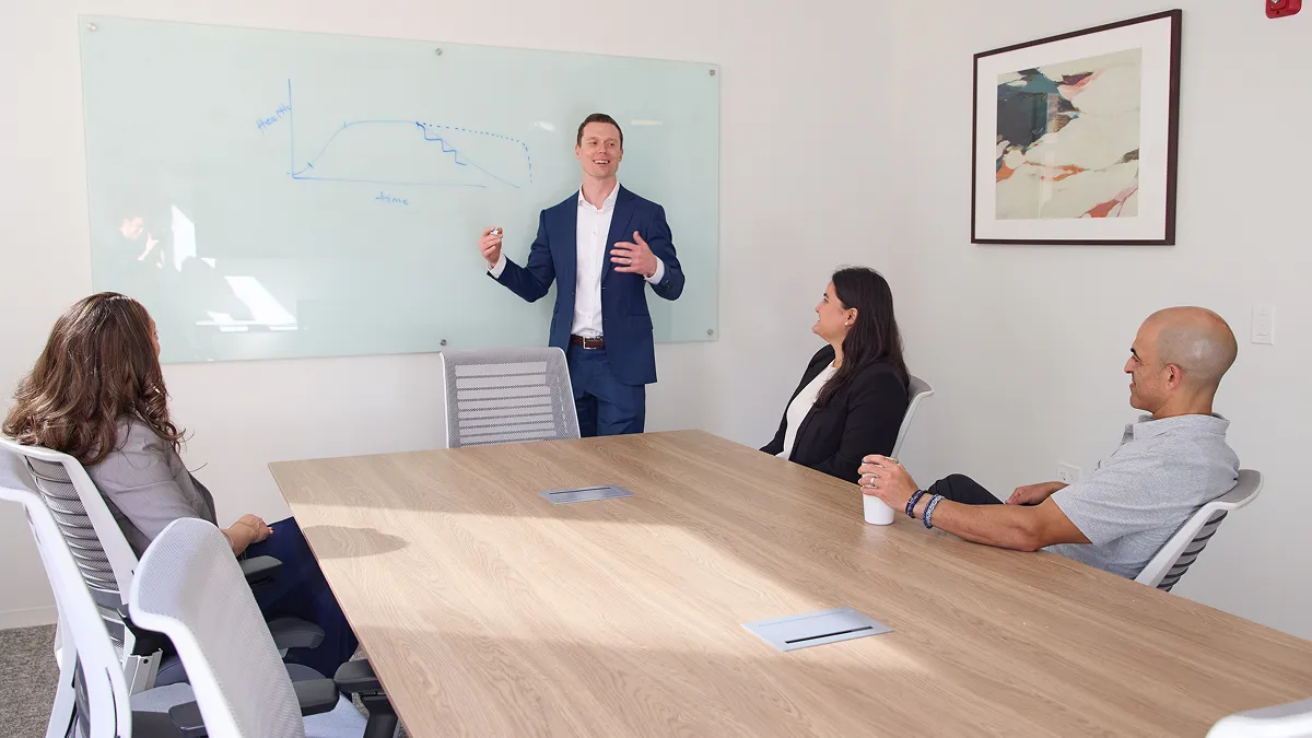 An executive team meeting at Shift Health in Chicago, IL