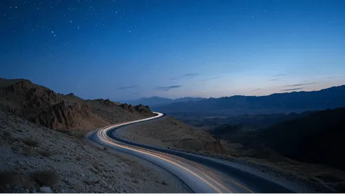 A road in the desert at night.