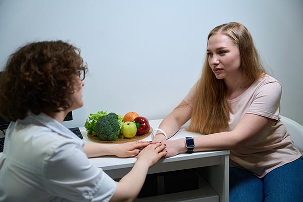 young woman with eating disorder seeking help from a professional eating disorder therapist in Lethbridge.