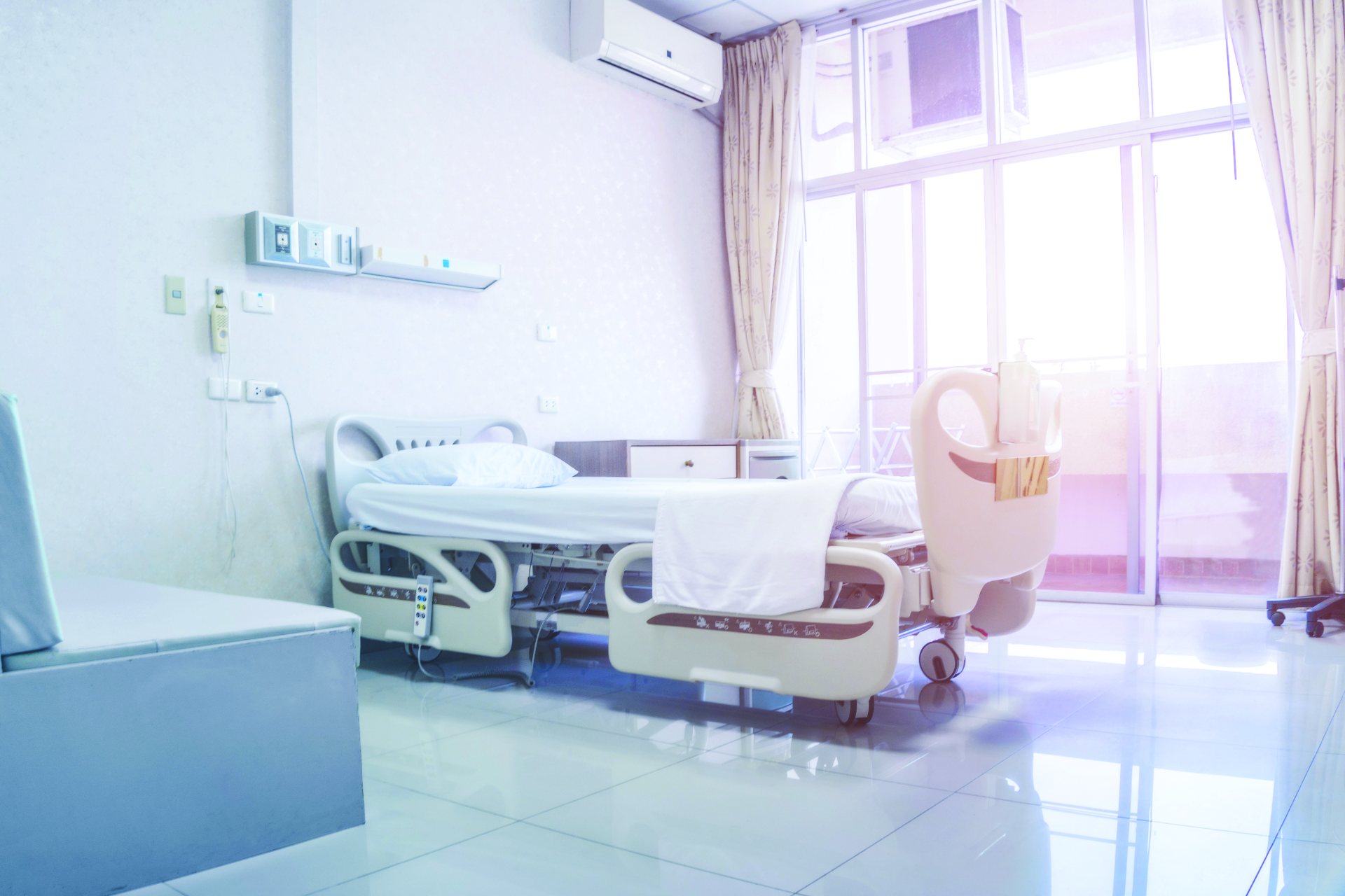 Futuristic hospital bed in sunny room