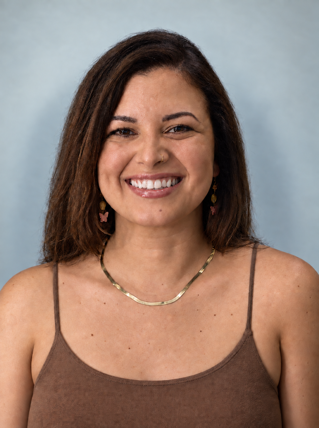 Portrait of Bre Reyes, RN, Aesthetic Nurse
