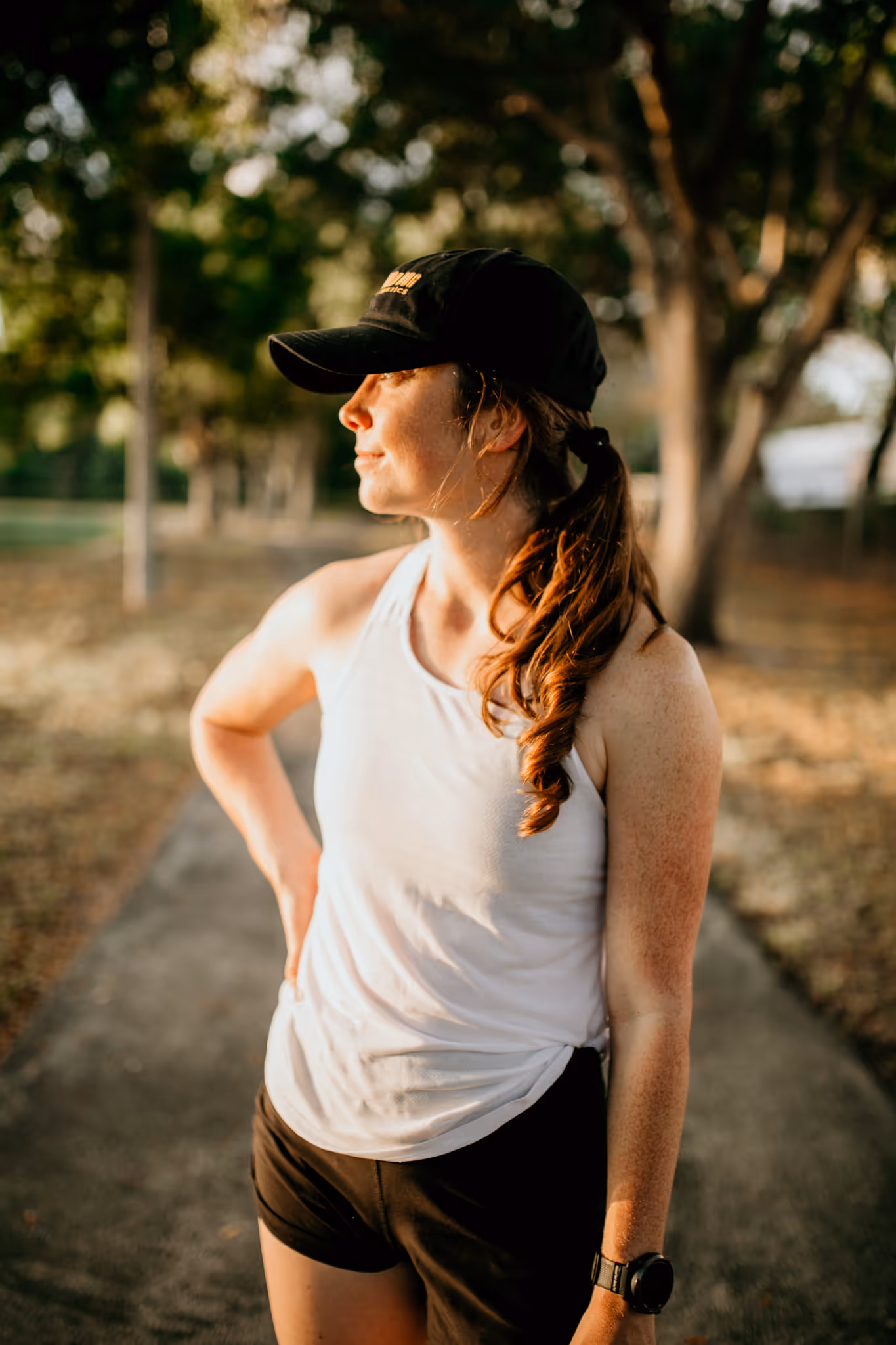Endurance running coach Abby of Wild Dog Athletics poses during her trail run.
