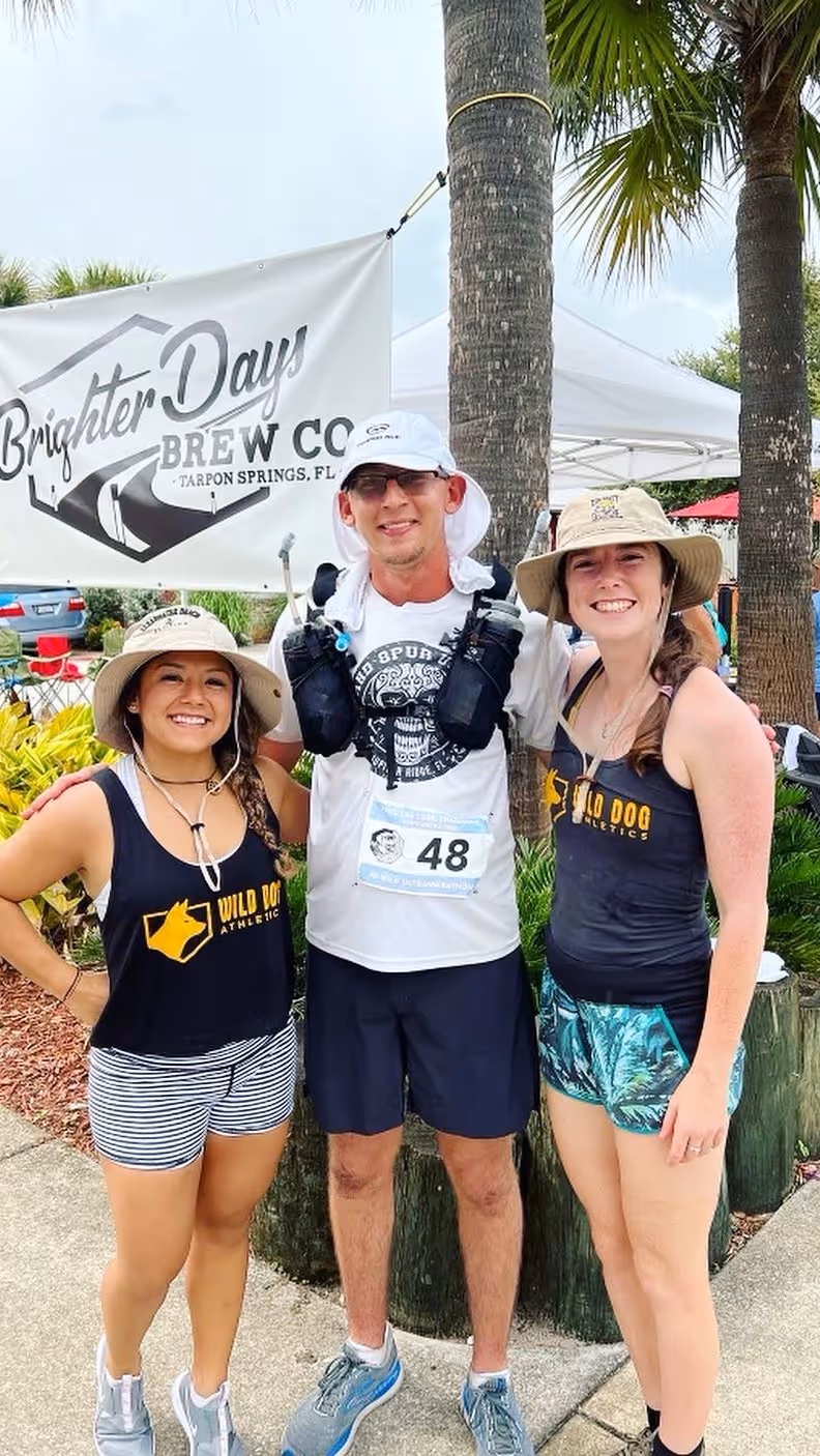 Coach Abby with athletes at local track event