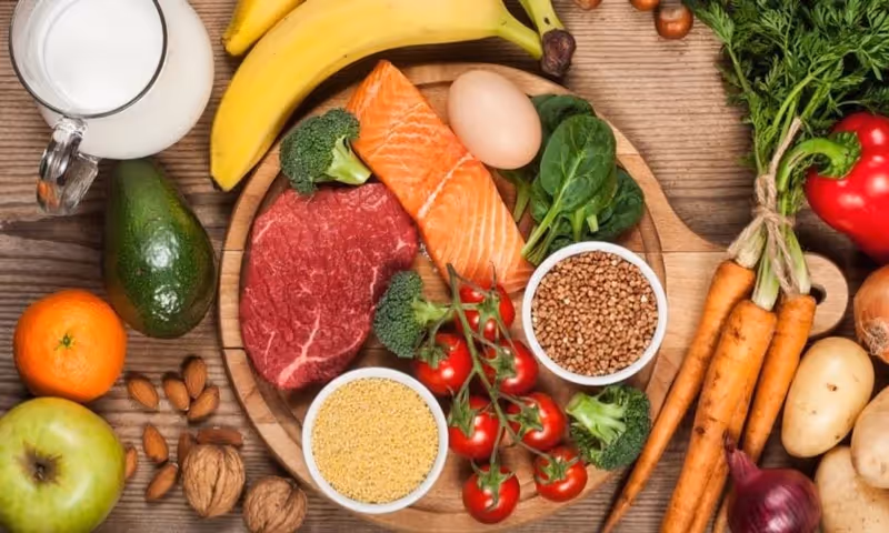 A variety of colorful fruits and vegetables on a plate.