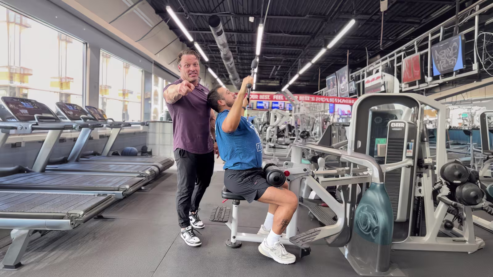 Richie and a client working out at Todd Smith Fitness