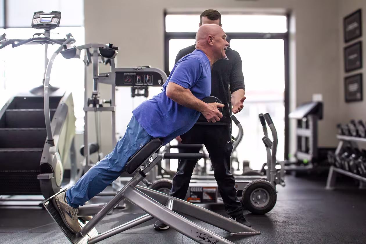client and trainer at Todd Smith Fitness gym in Omaha