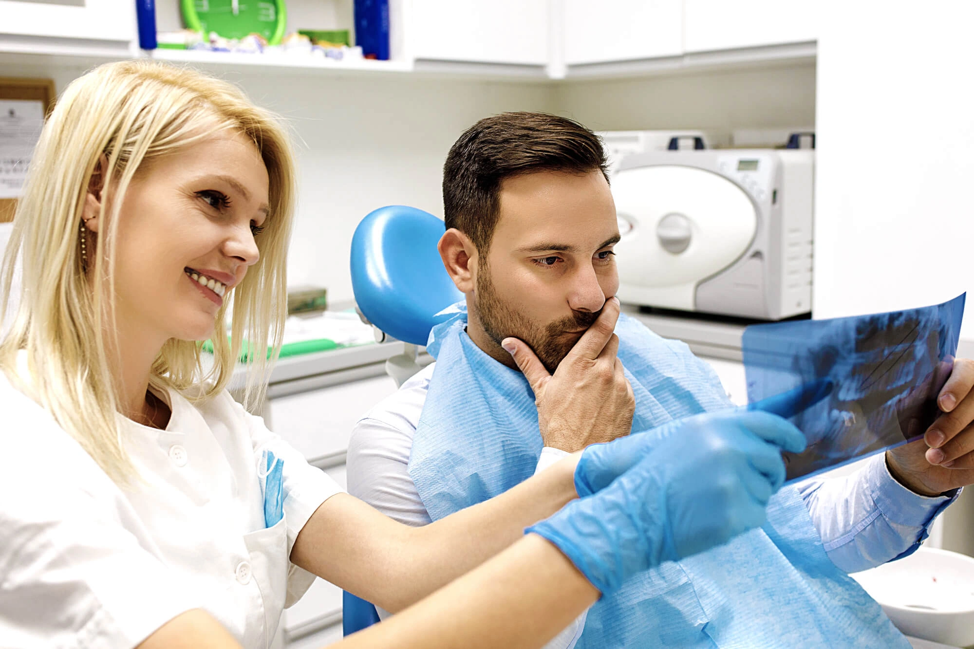 Man looking at his teeth xray with the best Dentist Guilford, CT