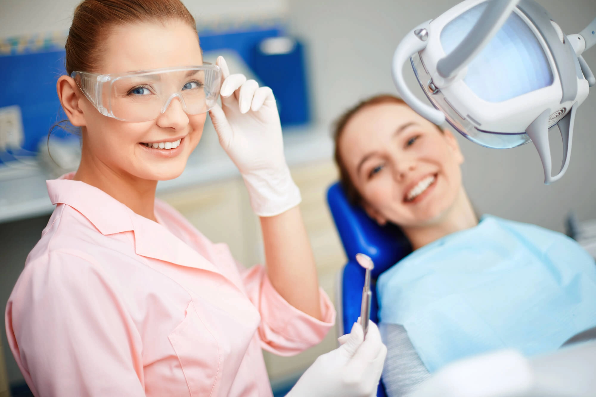 Dentist on the Shoreline CT smiling with woman