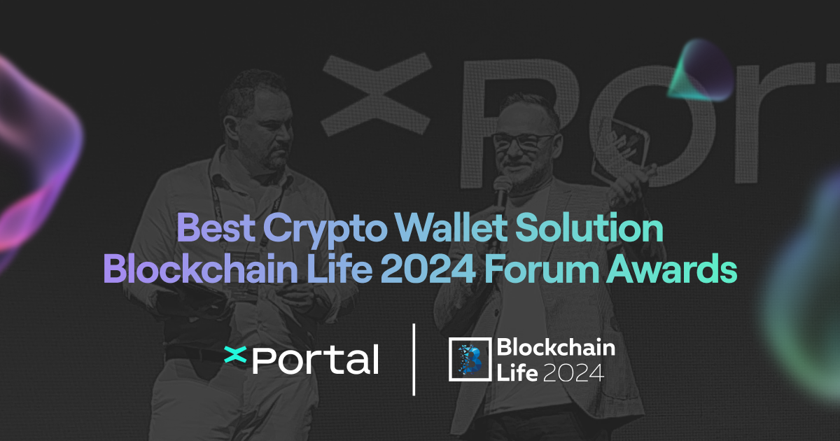 Sergiu Biris accepting the 'Best Crypto Wallet Solution' award in the background and the xPortal and Blockchain Life logos