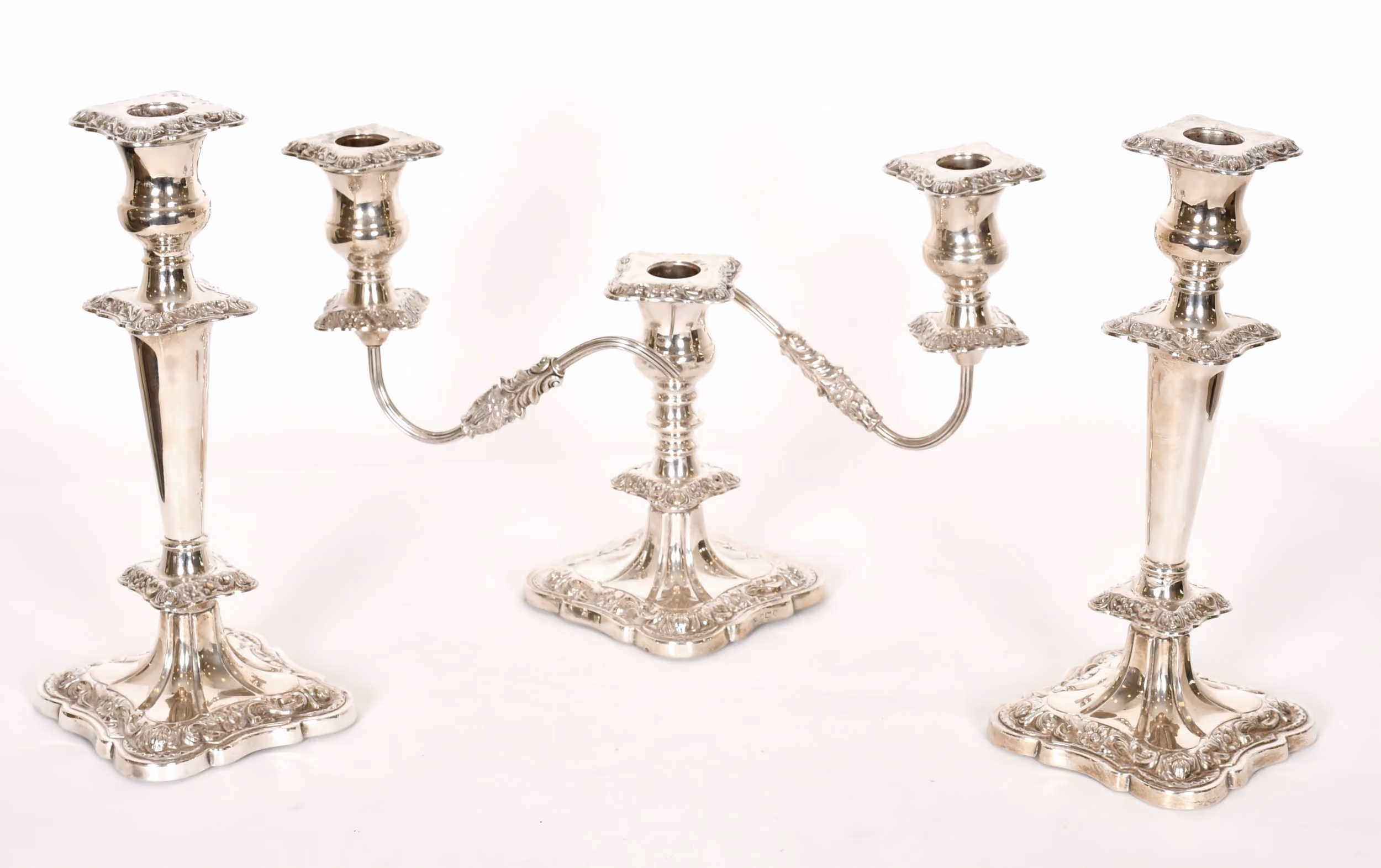 A Pair of Silver Candlesticks and A Single Twinned Branch Candelabra: Estimate: £600-£800