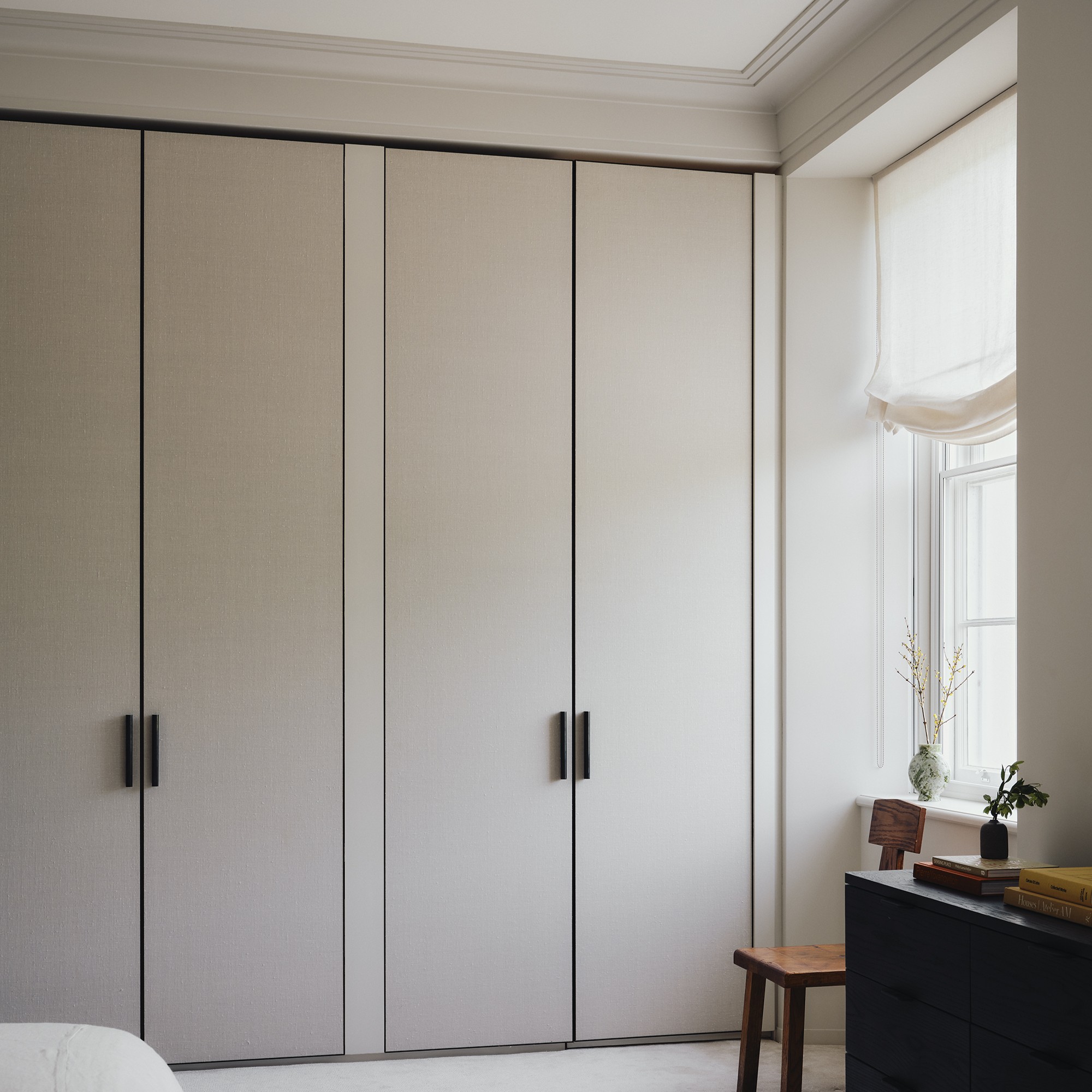 Shadow gap detail along the top of a door for air conditioning in a luxury residential interiorr