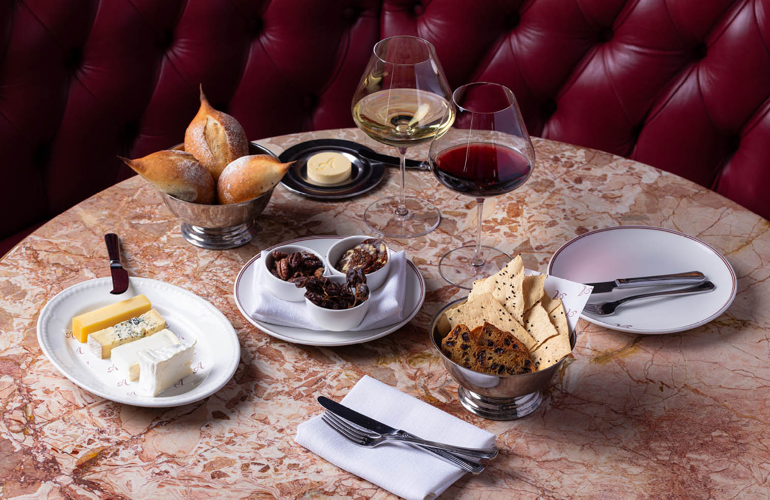 French cheese plate with bread, crackers and wine to finish a meal at Armorica, Surry Hills