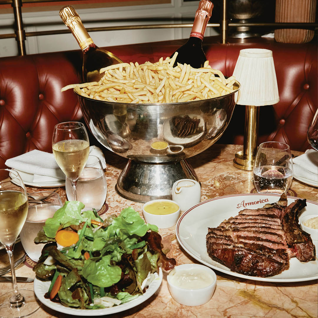Bottomless steak frites with fries in a Champagne bucket, every Monday night at Armorica, Surry Hills