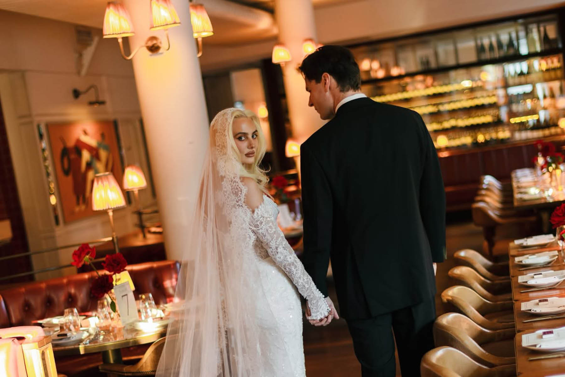 Newlyweds in the dining room at Armorica, a wedding reception venue in Surry Hills