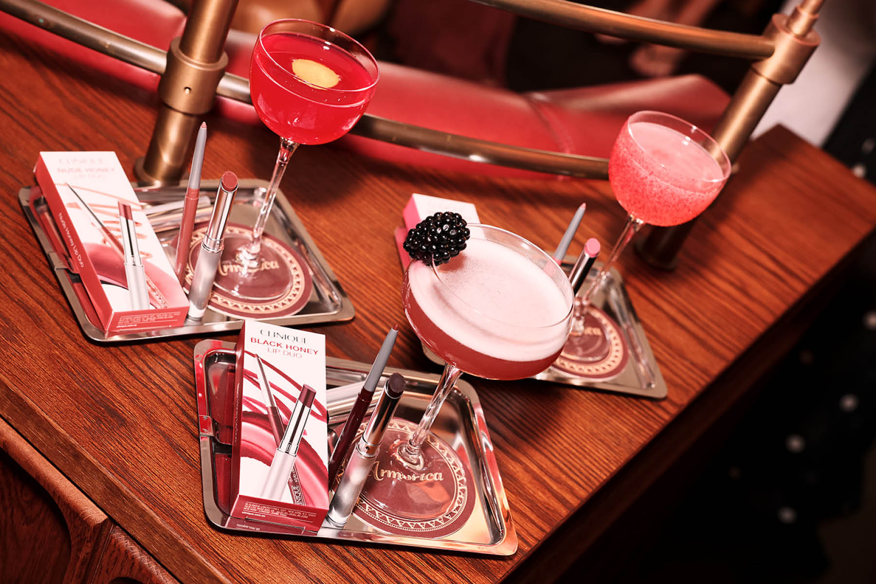 Pink cocktails on silver trays at a brand launch event hosted at Armorica, Surry Hills