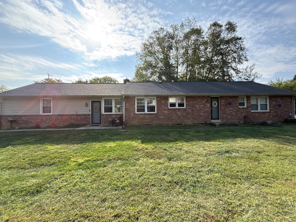 An Elsmere area home with new roofing and windows from Impriano Roofing & Siding