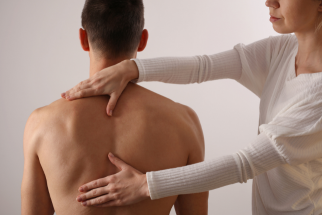 Dr. Steven Enriquez performing chiropractic care in Tempe AZ