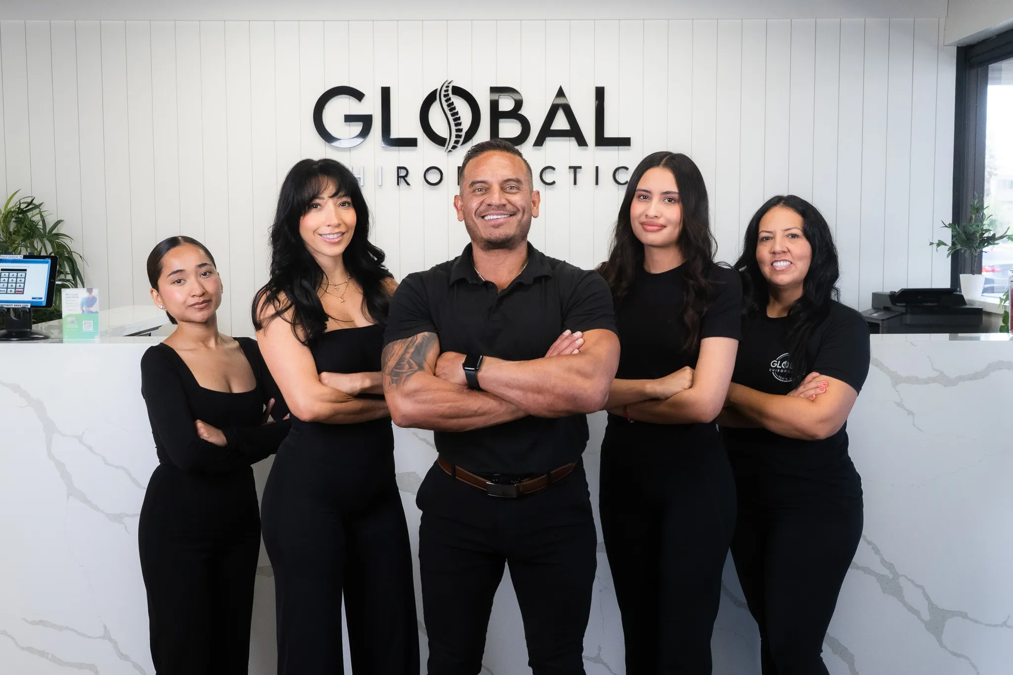 Global Chiropractic team photo — Tempe AZ chiropractor Dr. Steven Enriquez and staff