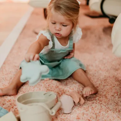 Lightly Salted Wellness Spa Orlando Florida Child Playing in Salt Room 2 scaled