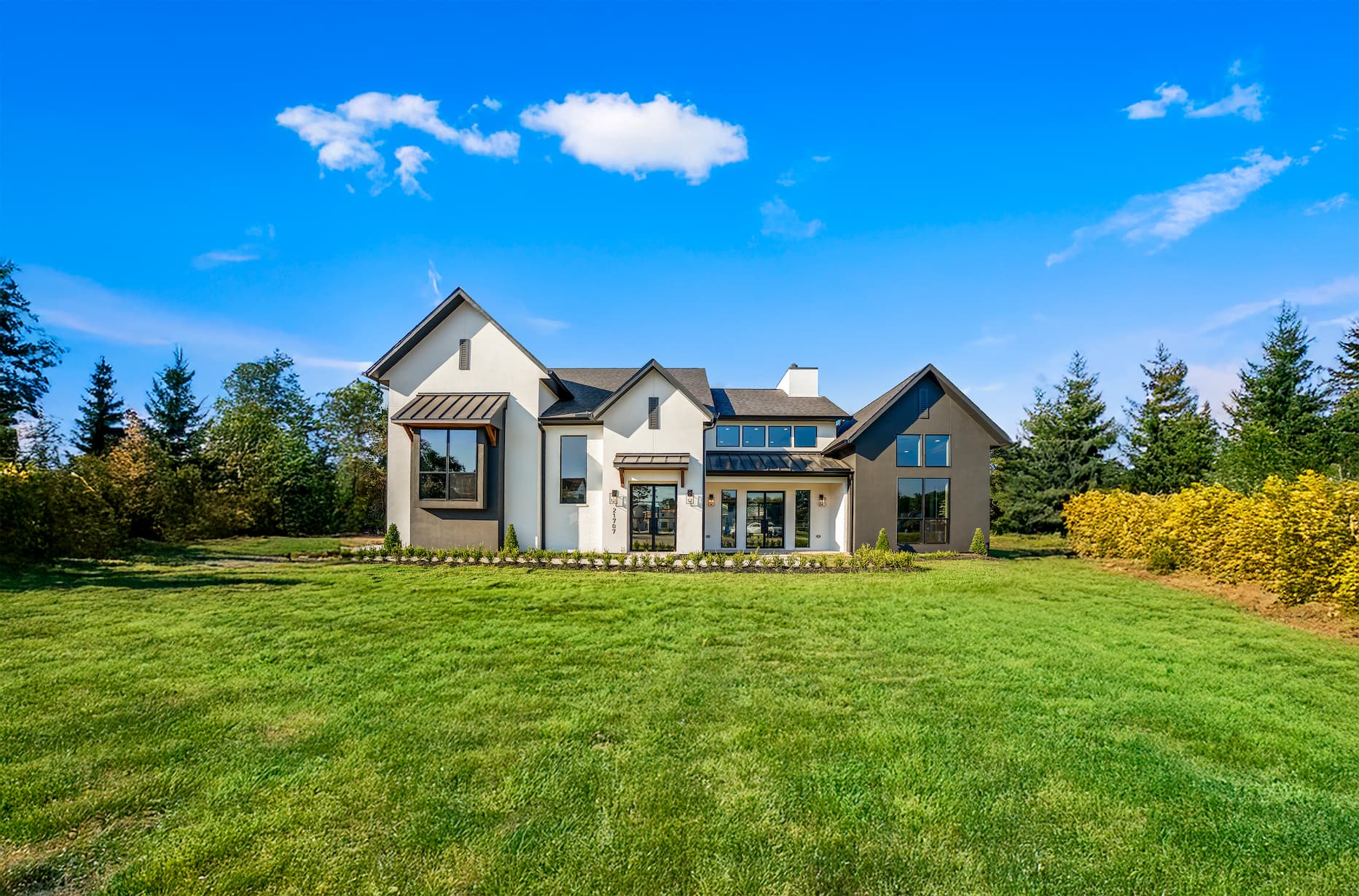 Beautiful black and white facade designed and built by Dominion Homes