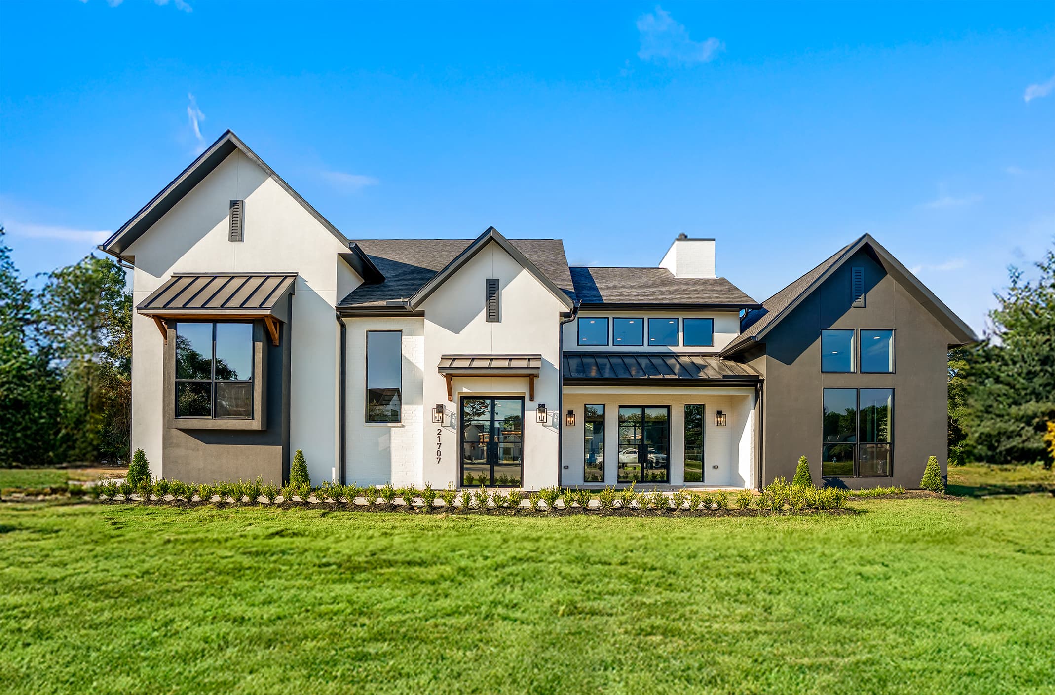 Beautiful black and white facade designed and built by Dominion Homes