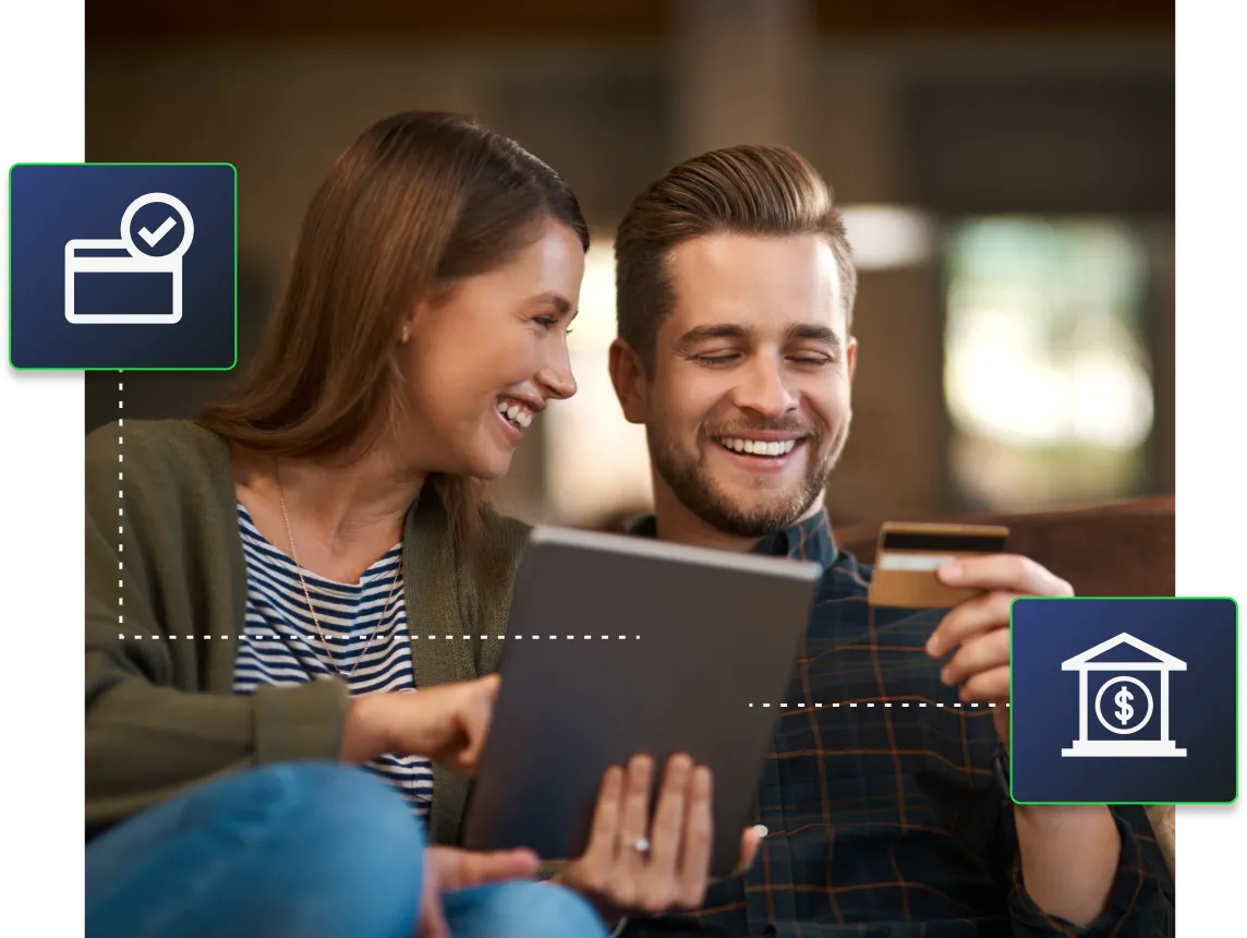 A couple using their tablet to make a payment that is sent via Instant Direct Payments