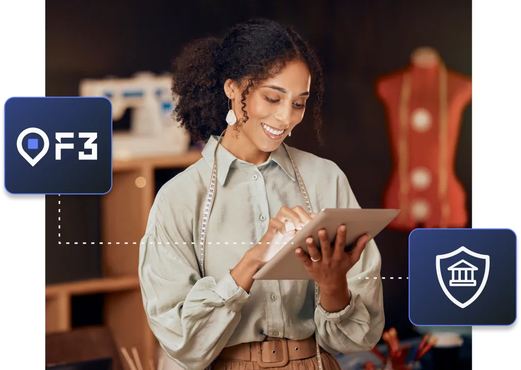 A woman who uses F3 to protect her transactions looking at a tablet.