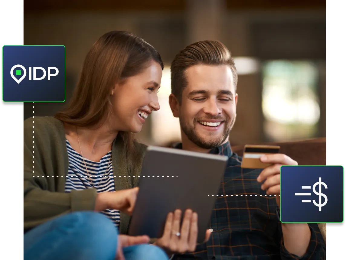 A couple using their tablet to make a payment that is sent via Instant Direct Payments