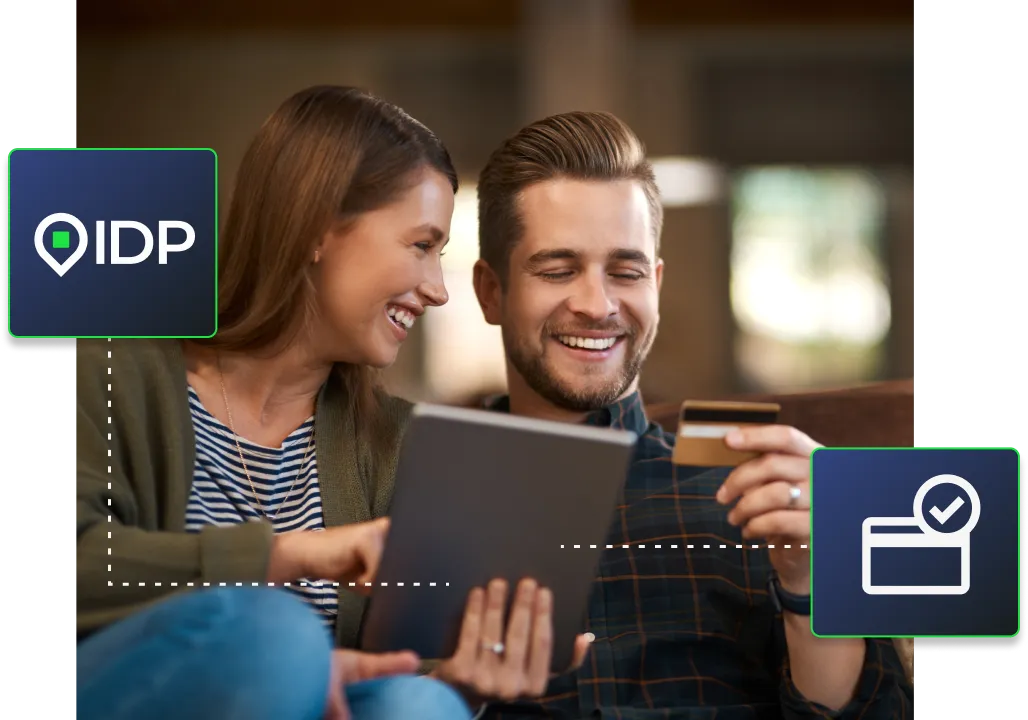 A couple using their tablet to make a payment that is sent via Instant Direct Payments