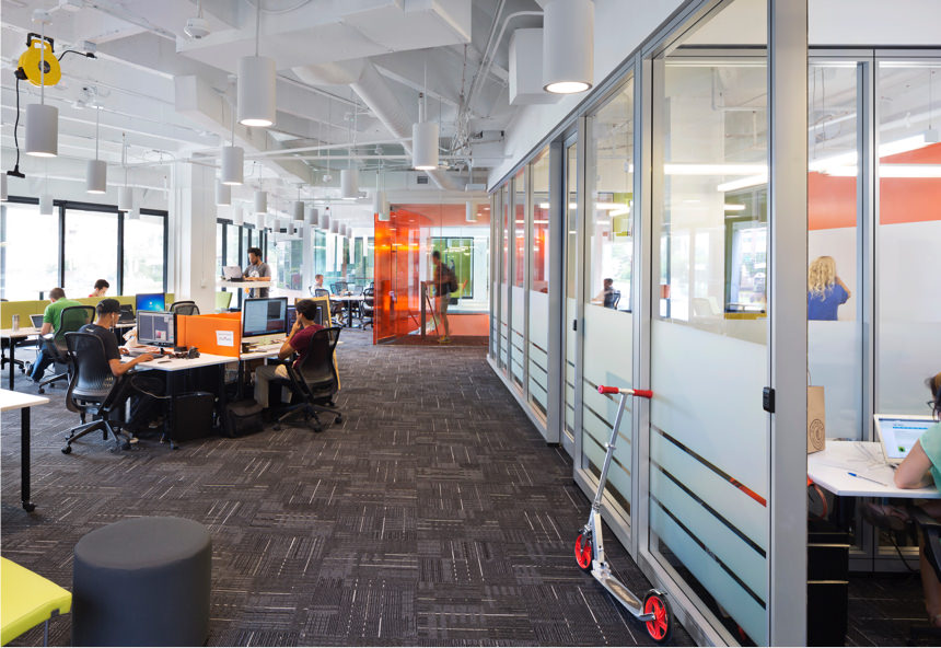 people working on computers at Atlanta Tech Village’s bright yet professional Buckhead coworking space