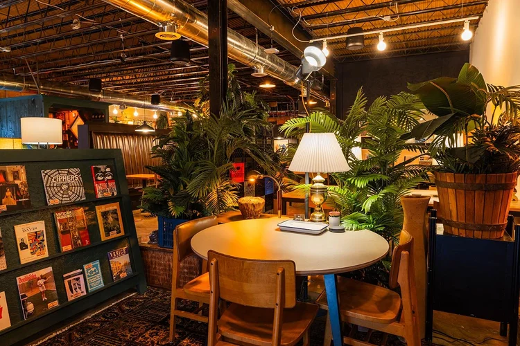 cozy work table surrounded by plants at Switchyard’s Avondale Estates coworking location in Atlanta