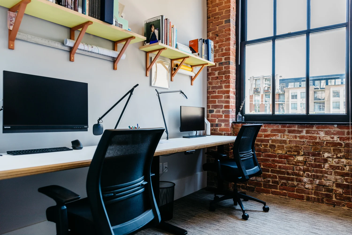 workstations with desktop computers at Constellations' coworking space in the Sweet Auburn district of Atlanta