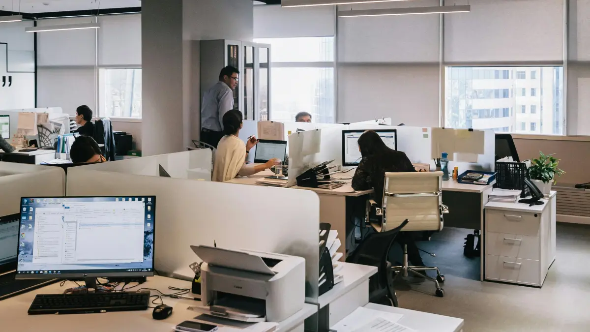 Man using a printer in an office
