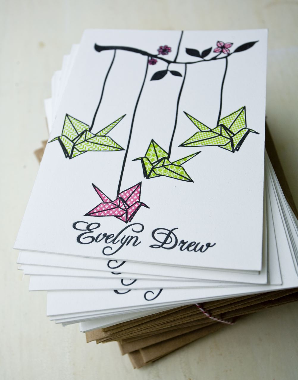 A letterpress card of paper crane mobile