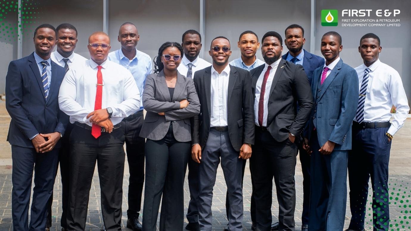 A group of people posing for a photoAI-generated content may be incorrect.