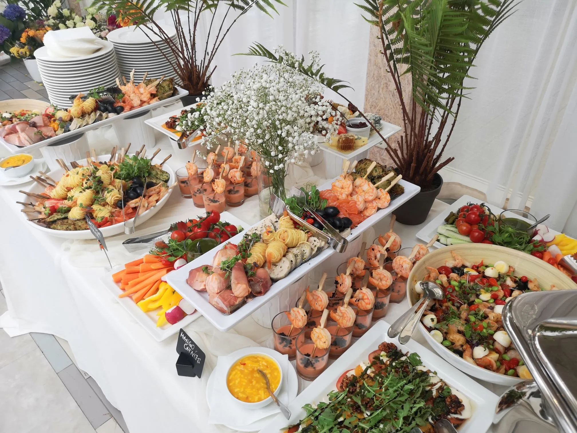 Palm Springs wedding buffet with colorful chef-prepared dishes