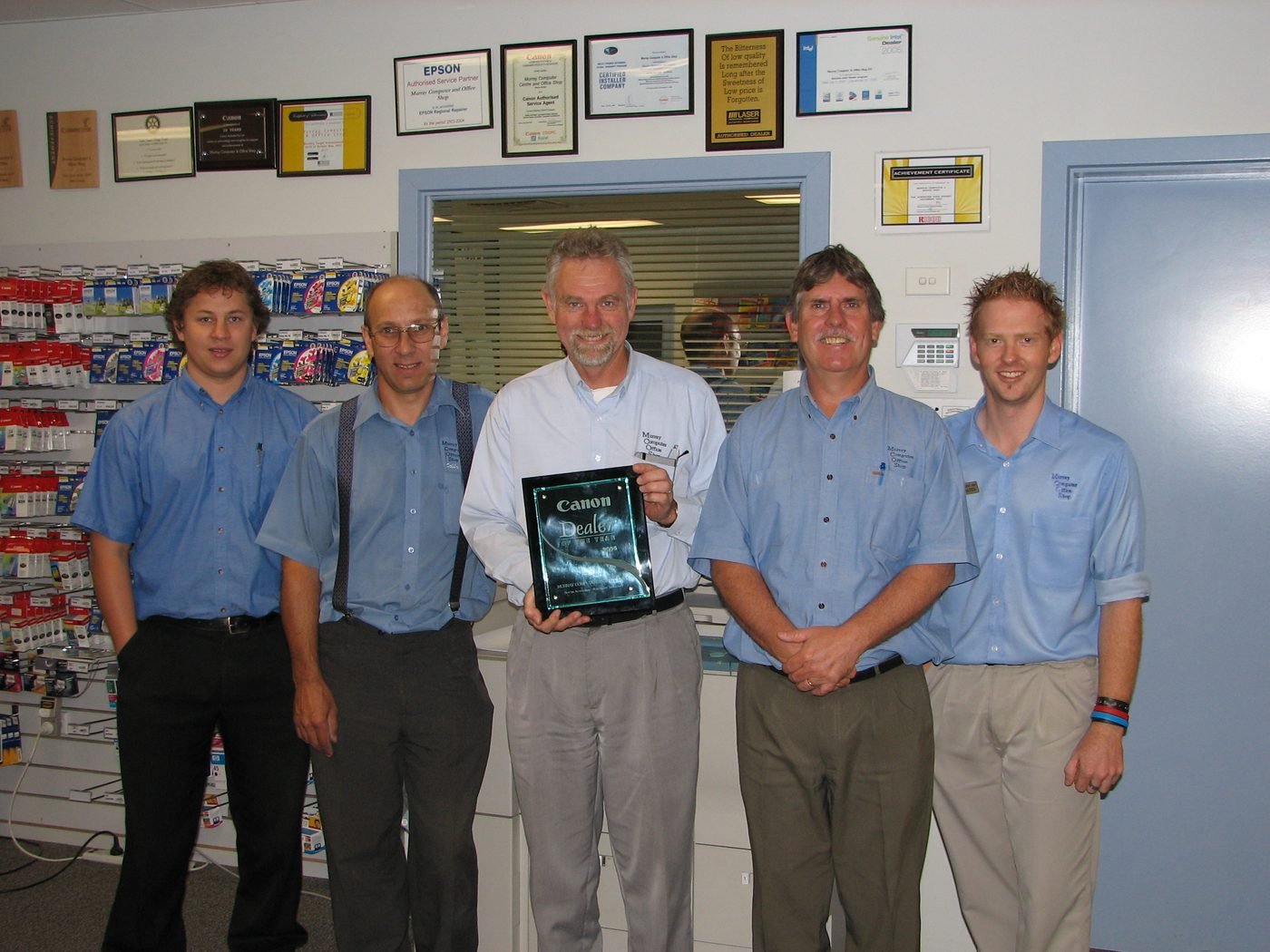 Murray Computers team with a Canon Dealer of the Year award in the Murray Bridge shop