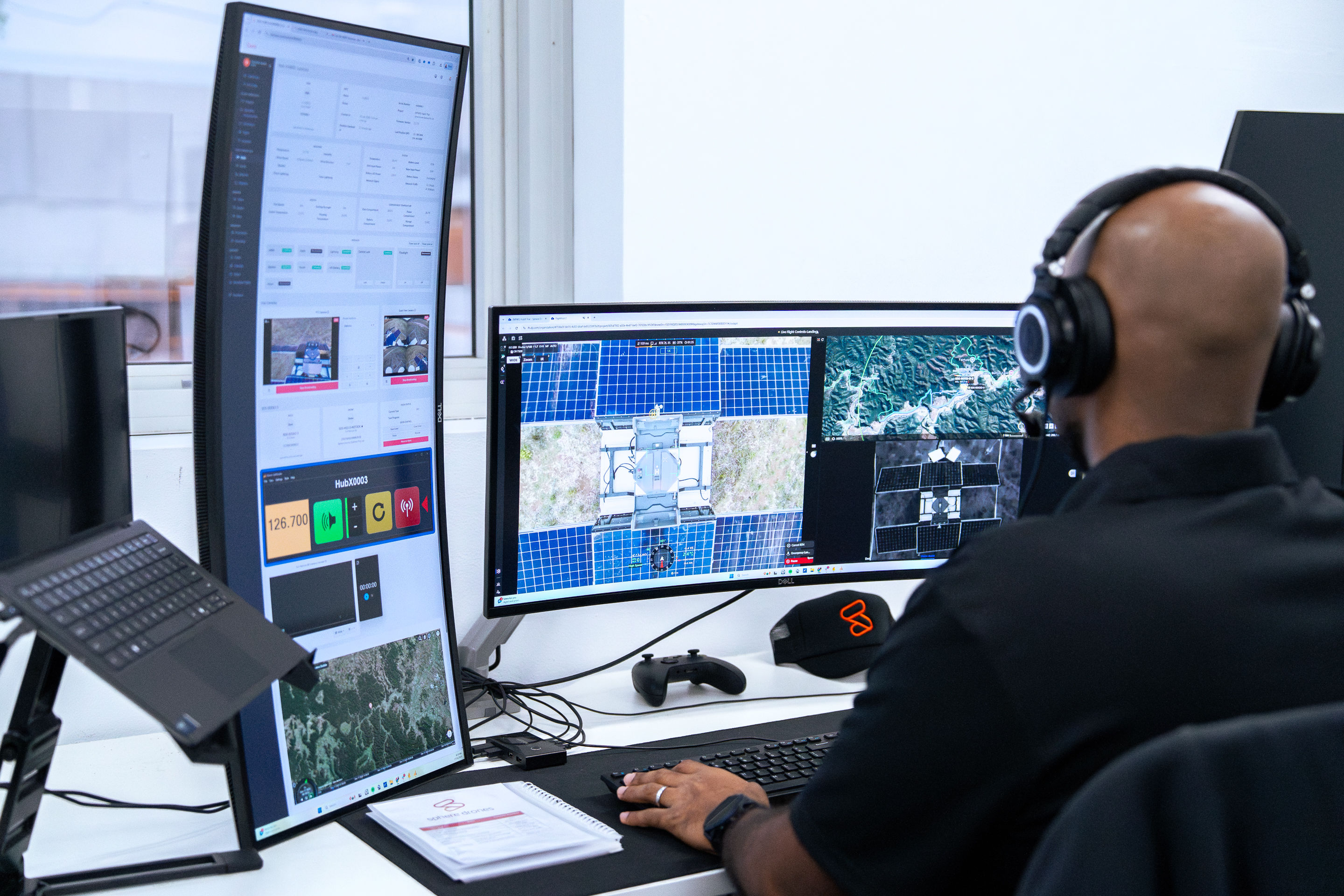 A remote pilot planning a mapping mission in the Remote Operations Centre