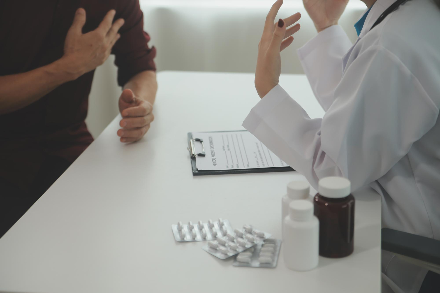 Man talking to doctor about his medication
