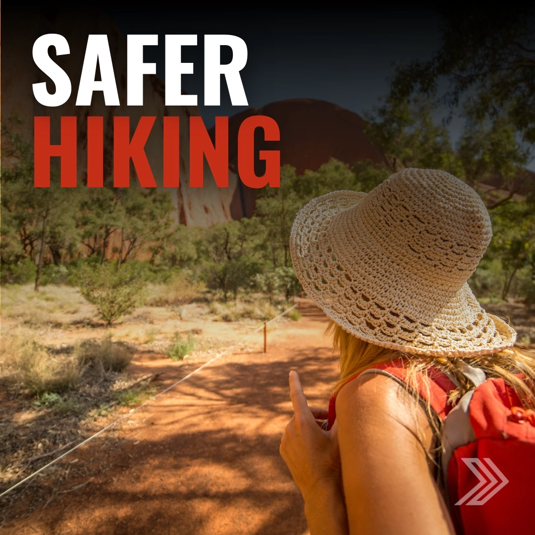 Click here for a safer hiking ad with a woman wearing a sunhat and backpack on a dirt trail in a scenic landscape.