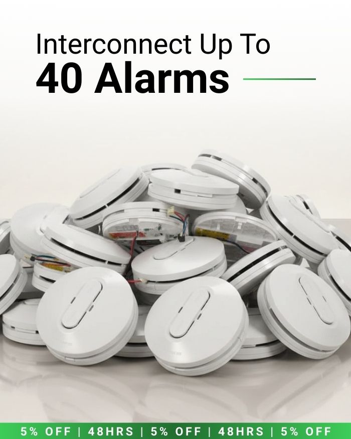 Group of Clipsal photoelectric smoke alarms illustrating interconnection capability for up to 40 alarms
