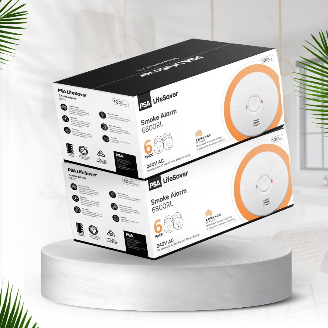 Click here for two PSA LifeSaver 6800RL smoke alarm six-pack boxes stacked on a display stand.