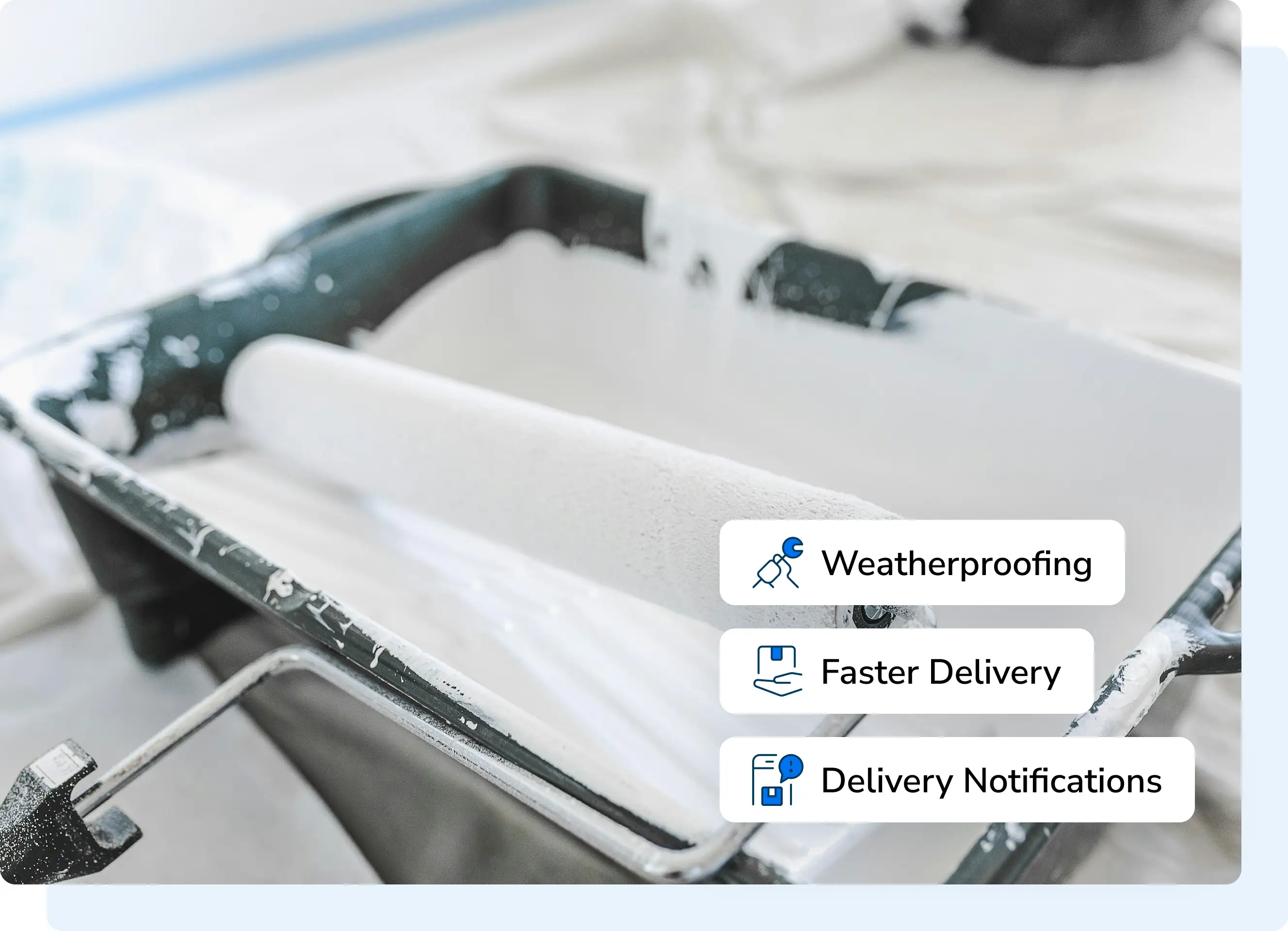 Paintbrushes, rollers, and a hard hat arranged to illustrate paint supply delivery services.