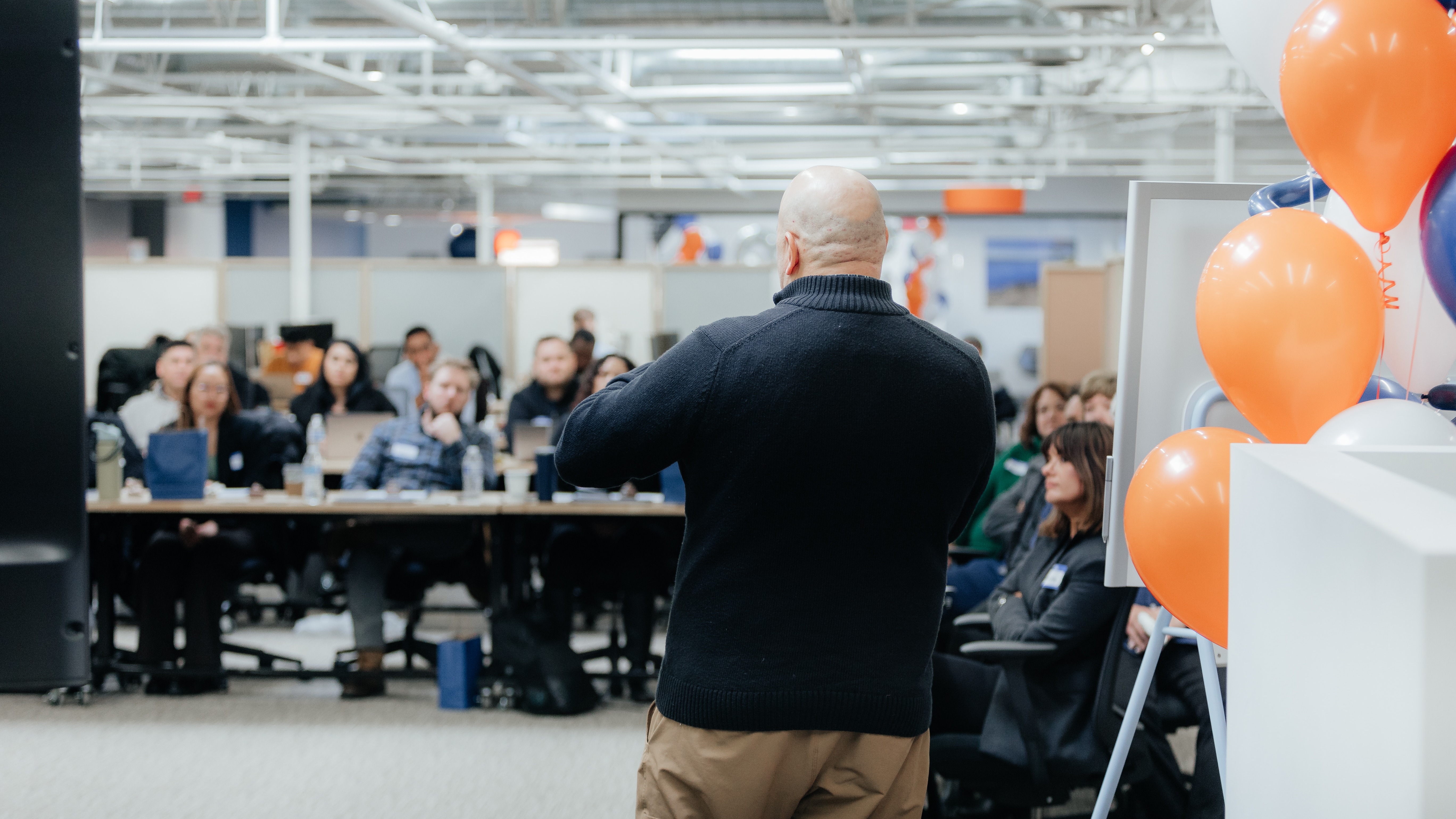 Dispatch team members gathered for a company presentation.