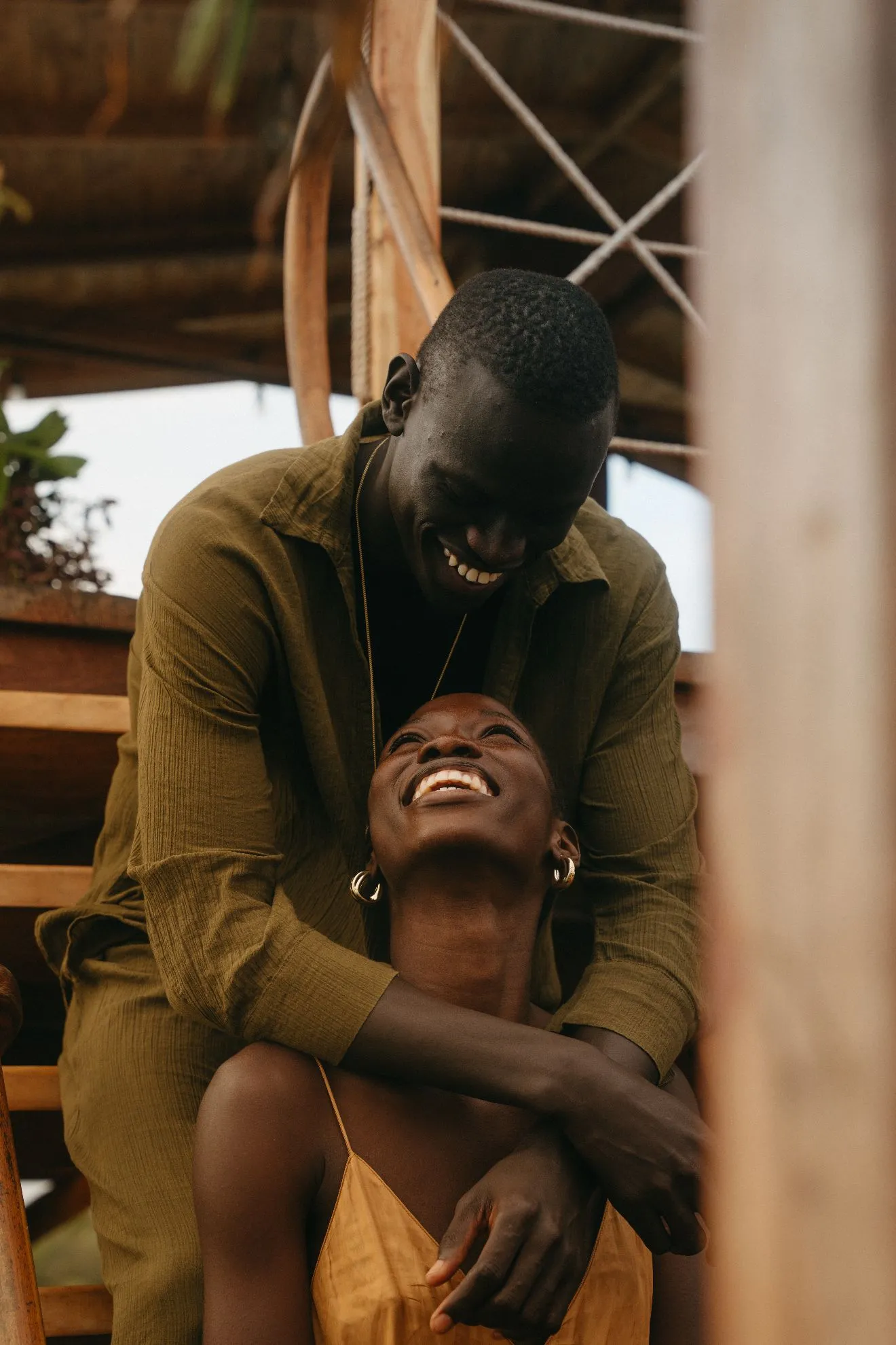 A couple laughing together on board Musafir