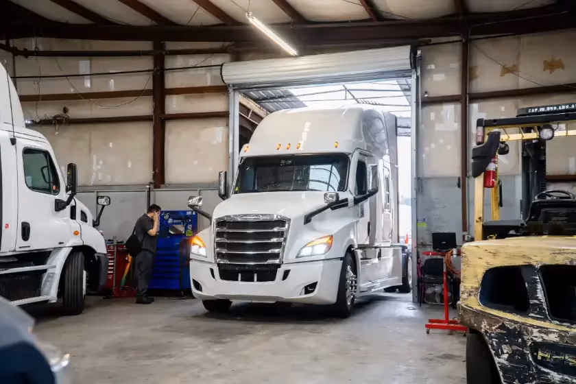 Diesel mechanic performing Express lube repair services in Fontana, CA