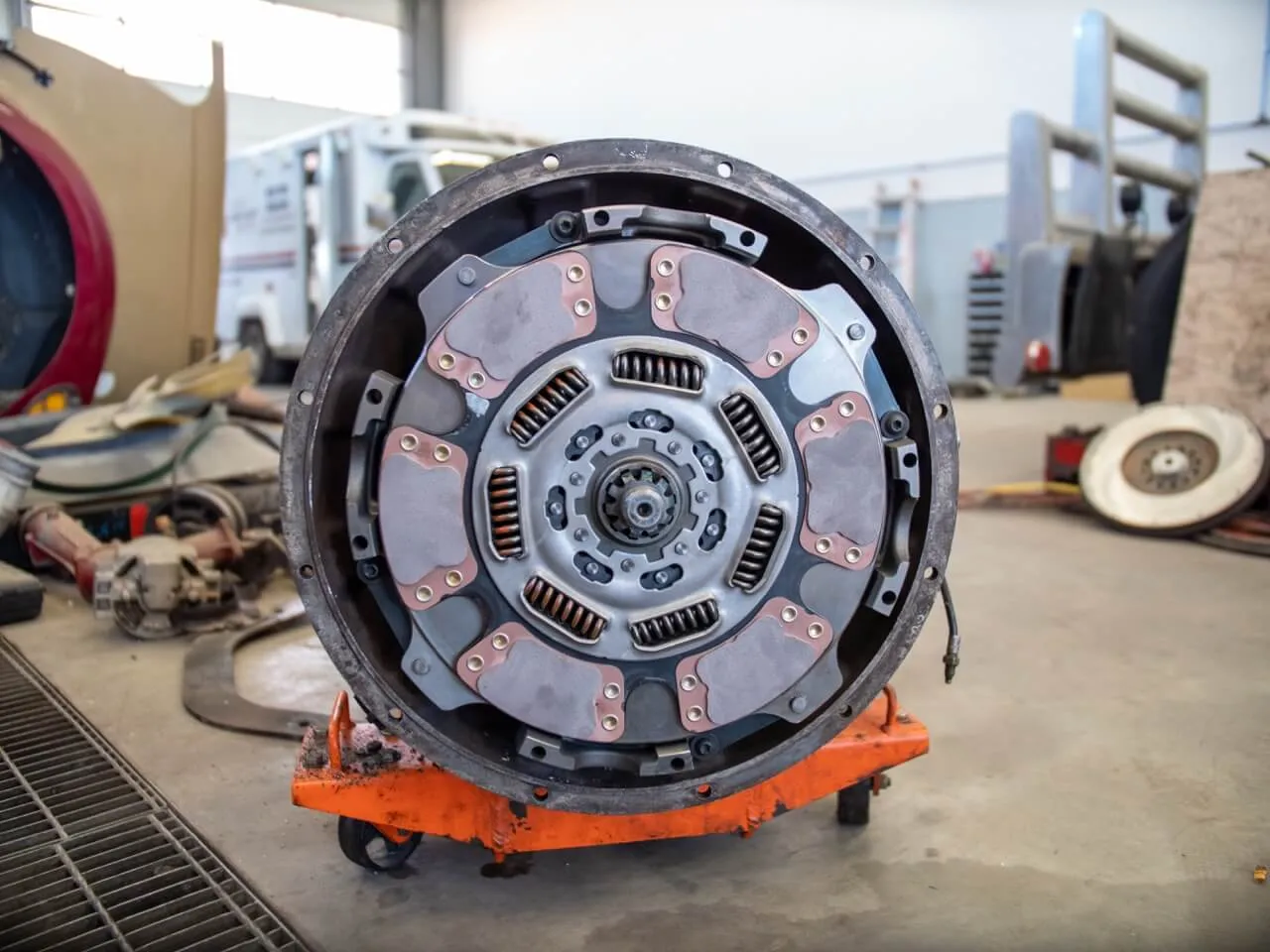 Clutch winterization in progress with heavy-duty clutch assembly removed for cleaning and cold-weather prep.