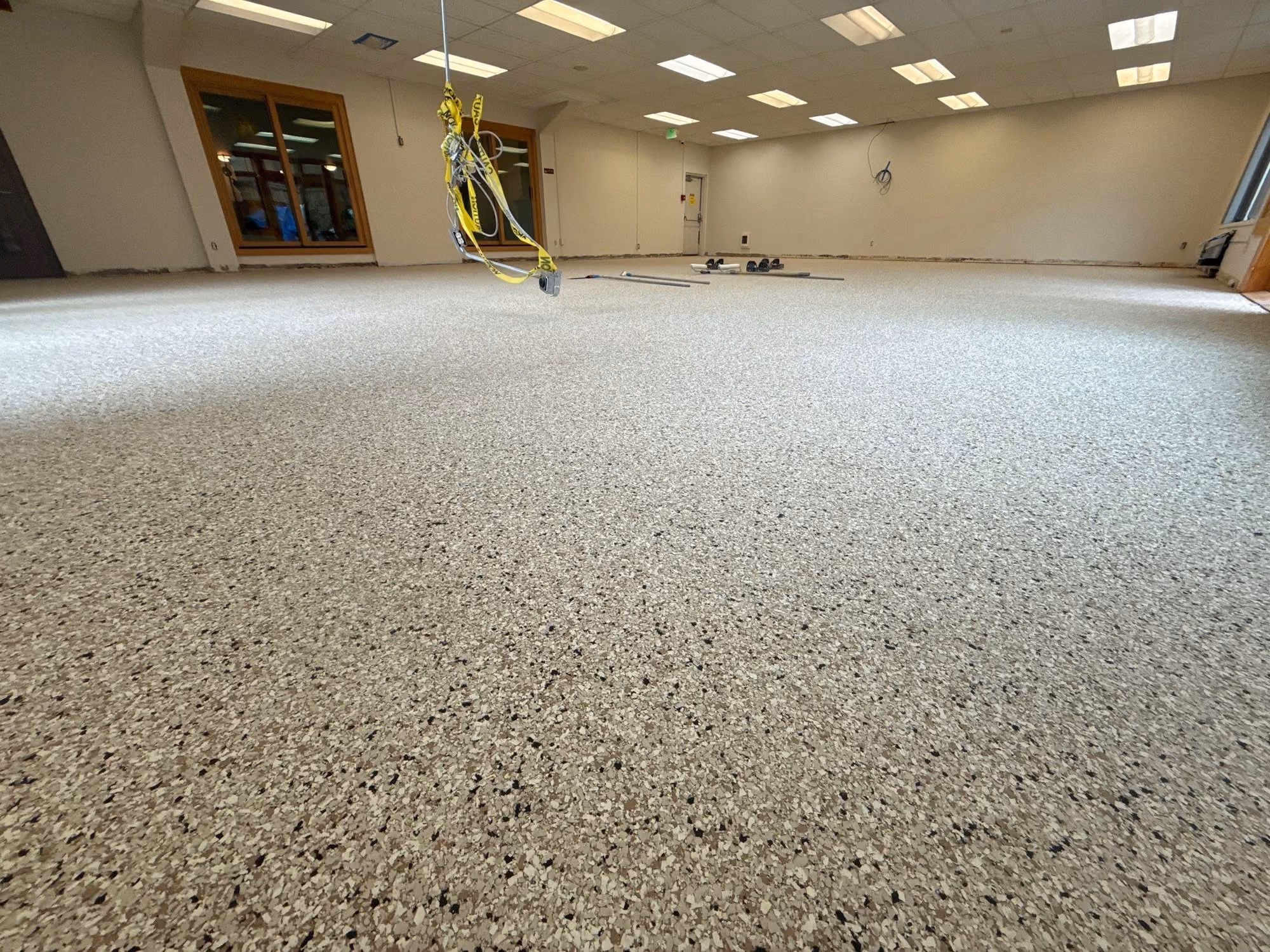 Driftwood Evolution epoxy flake floor by Cascade Concrete Coatings