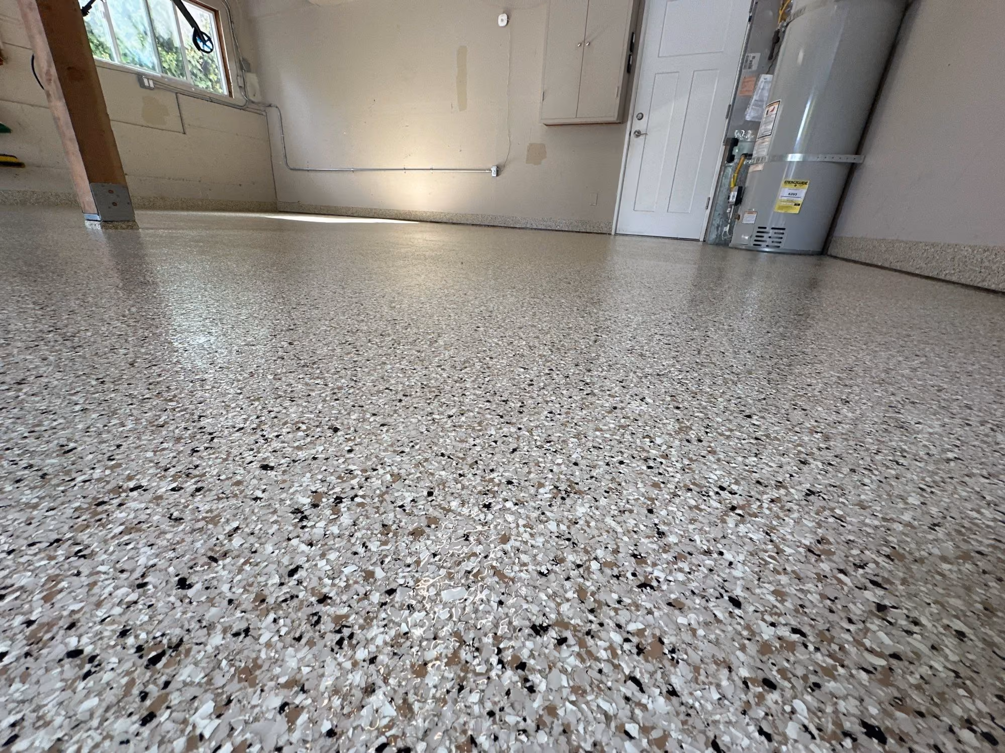 Driftwood Evolution epoxy flake floor by Cascade Concrete Coatings